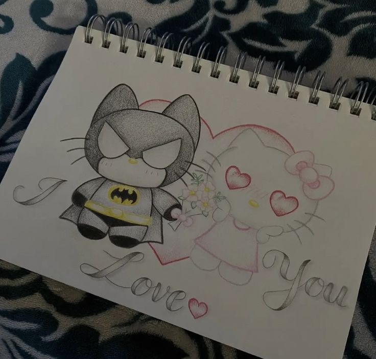 a drawing of a cat and a batman with the words i love you written on it