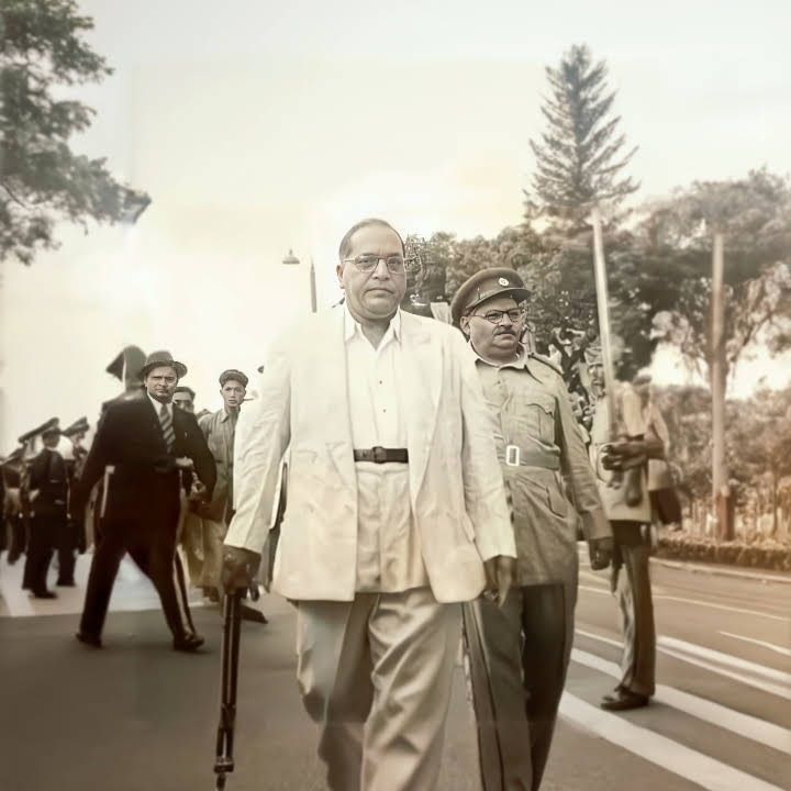 two men are walking down the street with other people in uniform behind them and one man is holding a cane