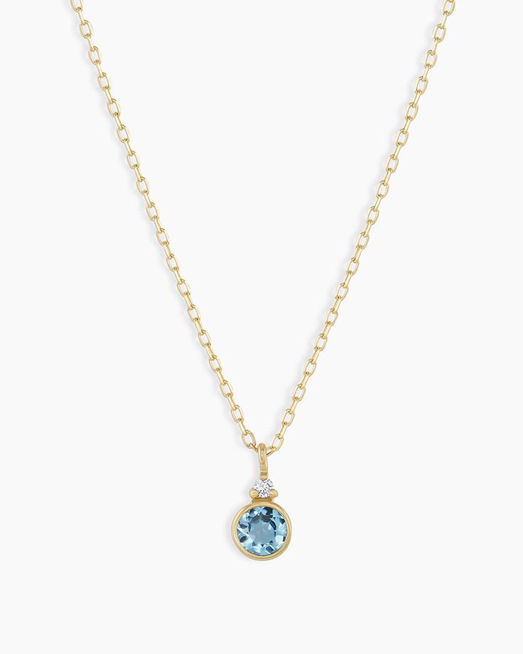 A modern heirloom. Introducing our take on a traditional style. Whether you wear yours or a loved one’s, a birthstone necklace is an easy way to add color and meaning to your look. This birthstone necklace features a 14k gold chain and diamond detail and makes for a perfect, personal gift. Blue Topaz is December's birthstone. Product Details Diamond: 0.01 total carat weight, 1.3 mm GH SI1-SI3 Blue Topaz: 0.15 total carat weight, 3 mm genuine blue topaz 14k solid gold 16" chain + 2" extender. Adj Bezel Pendant Ideas, 14k Gold Jewelry With Gemstone Accents For May Birthstone, Yellow Gold Solitaire Pendant Necklace With Birthstone, Yellow Gold Solitaire Necklace With Gemstone Pendant, 14k Gold Jewelry With May Birthstone Gemstone Accents, Yellow Gold Birthstone Necklace With Round Stone, 14k Gold Birthstone Necklace With Gemstone Accents, Everyday Birthstone Necklace With Delicate 14k Gold Chain, Fine Jewelry Birthstone Necklace With Delicate Chain