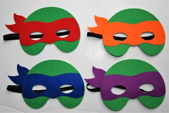 four masks with different colors and designs on them