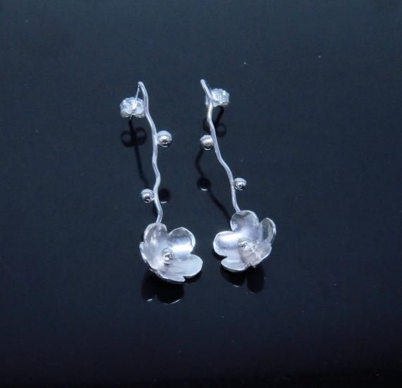 This is a unique pair of handmade flower earrings in sterling silver. I started the earrings from a sterling silver sheet to make the flower and soldered the flower bud and stem together. The earrings were hand polished. It’s a perfect gift for mom, daughters, sisters, wife, bridesmaids, Sterling Silver Flower Earrings, Silver Flower Earrings, Nature Earrings, Jewelry Simple, Handmade Flower, Elegant Flowers, Sterling Silver Flowers, Flower Jewelry, Flower Bud