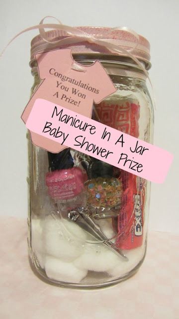 there is a jar with baby shower items in it