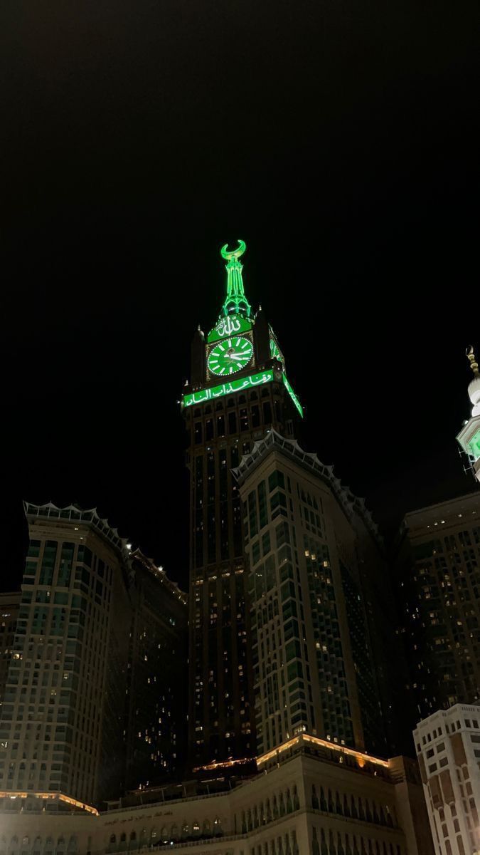 the building is lit up in green for st patrick's day