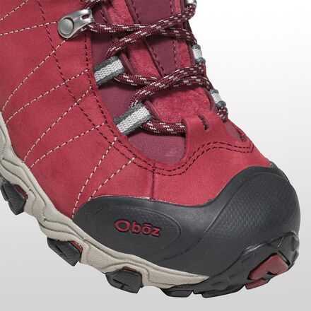 The odds that you'll avoid rainy weather decrease with every new day on the trail, so whether you're headed out for a weekend getaway, a week-long adventure, or you just quit your job for a few months of trail-rambling, you're going to want the added assurance and support of the Oboz Bridger Mid B-Dry Wide Hiking Boot. This special wide version tacks on some added room to its already roomy toe box, perfect for hikers with wider feet or those who want to do some serious sock-layering. Waterproof Round Toe Boots For Outdoor, Waterproof Round Toe Outdoor Boots, Waterproof Adventure Boots With Round Toe, Durable Waterproof Boots For Outdoor Activities With Round Toe, Rugged Red Boots For Outdoor, Rugged Red Outdoor Boots, Weatherproof Round Toe Walking Shoes For Outdoor Work, Durable Round Toe Boots For Outdoor, Durable Round Toe Outdoor Boots