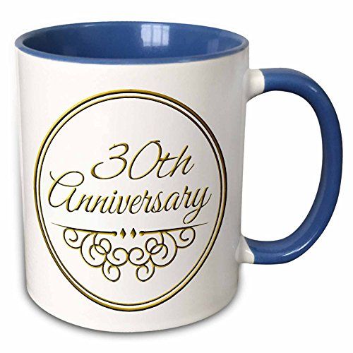 a blue and white coffee mug with the words 25th anniversary on it's side