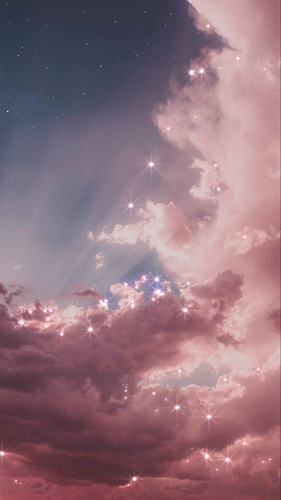 the sky is filled with stars and clouds