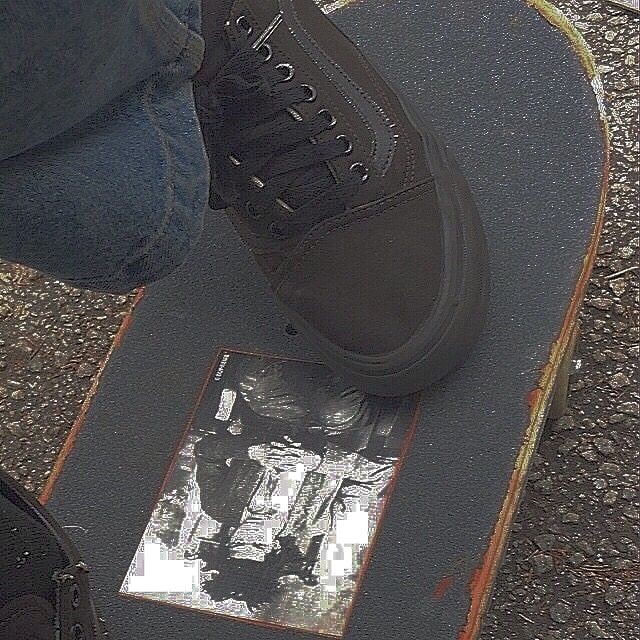 a person standing on top of a skateboard