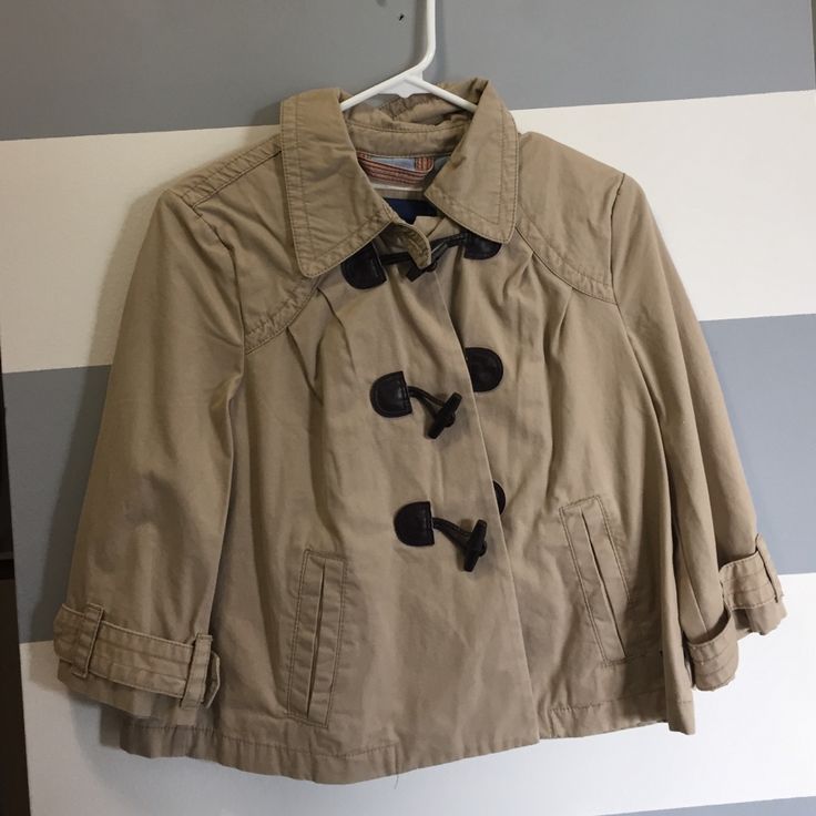 This Adorable Khaki Jacket With Button Down Detailing On The Front Can Be Yours Just In Time For Fall! Perfect Condition With Tags In Tact. Trendy Button-up Pea Coat With Buttons, Casual Collared Pea Coat With Button Closure, Casual Khaki Pea Coat With Buttons, Beige Fall Outerwear With Covered Buttons, Fall Beige Outerwear With Covered Buttons, Elegant Beige Outerwear With Covered Buttons For Fall, Fall Collared Outerwear With Covered Buttons, Collared Outerwear With Covered Buttons For Fall, Fall Outerwear With Covered Buttons And Collar