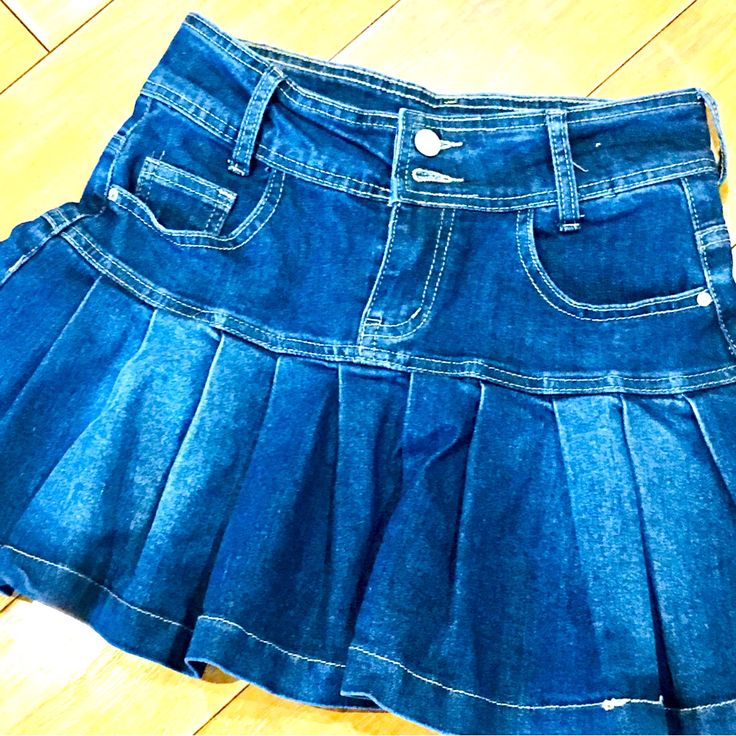 Denim Stretch Mini School Skirt Blue Jeans Pleats Pleated Pockets Small Small Soft Denim Cotton Poly Elastase Blend New Without Tags Mini Denim Jean Skirt Soft And Cozy Thick Denim Stretch Blend Zip Button Closure Pull On Style 26” Waist Before Stretch 28” Waist After Stretch 13.5” Length Cleaning Out Our Personal Closets And Dunn Farmhouse Home Decor - Tons Listed !!! Tag Your Friends In Comments About Me Page For More Info Follow Me For New Listings Pairs Best With White Tank Top Brown Sandals Pairs Best With White Sweater And Boots Poshmark Shoechic30 @Shoechic30 Summer #Summervibes #Denimskirts #Miniskirts #Backtoschool #College Pleated Medium Wash Denim Bottoms, Pleated Denim Blue Bottoms, Pleated Denim Blue Denim Bottoms, Casual Pleated Denim Mini Skirt, Blue Denim Pleated Skort, Blue Pleated Mini Denim Skirt, Blue Mid-rise Cotton Skort, Denim Pleated Skirt In Dark Wash, Casual Pleated Denim Blue Skirt