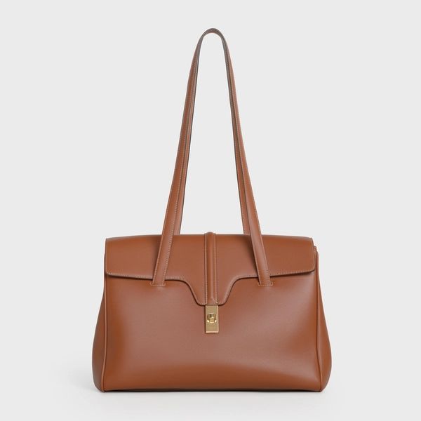 Medium Soft 16 Bag in Smooth Calfskin - Tan - 195543CR4.04LU | CELINE Luxury Bags With Hasp Closure For Work, Luxury Business Shoulder Bag With Hasp Closure, Luxury Business Flap Bag With Hasp Closure, Luxury Bags With Hasp Closure For Workwear, High-end Brown Shoulder Bag For Office, High-end Brown Business Shoulder Bag, Luxury Leather Flap Bag With Hasp Closure, High-end Rectangular Shoulder Bag For Work, Timeless Shoulder Bag With Hasp Closure