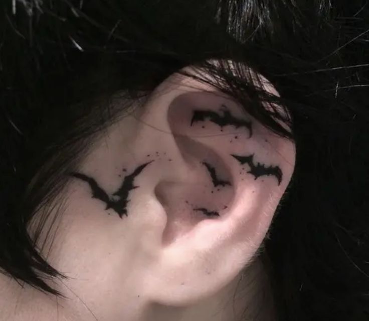 the ear is decorated with black bats