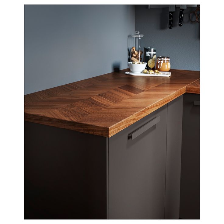 a wooden counter top in a kitchen