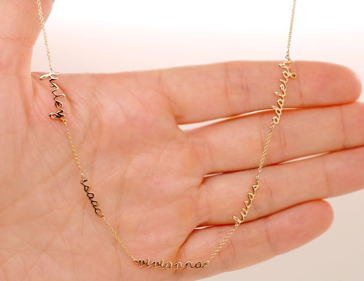 This is a custom, made to the order solid 14K gold necklace with one, two, three or four or more names. Ideal gift for a mother of three (or grandma!) - a durable high quality necklace with the names of their favorite people. This is a tiny names necklace with 1, 2, 3 to 4 pendants and chain spaces between names (usually 0.5in or 1in) Different chain lengths are available. Each name is 0.6-1 inch wide and about 0.14 in tall, with 1.65mm thickness (15-20mm wide and 4mm tall). The size estimate is Customized Yellow Gold Necklace For Mother's Day, Custom Yellow Gold Necklace For Mother's Day, Yellow Gold Name Necklace As Gift For Mom, Yellow Gold Necklaces With Names For Mom, Personalized Name Necklace In Yellow Gold, Personalized Yellow Gold Necklace With Names, Custom Yellow Gold Names Necklace For Mother's Day, Customized Yellow Gold Charm Necklaces For Mother's Day, 14k Gold Name Necklaces For Birthday