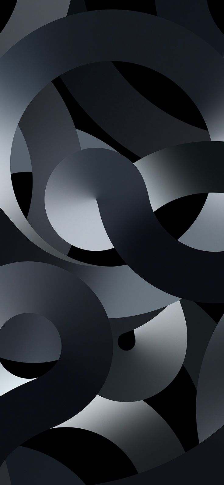 an abstract black and white photo with circles in the middle, on a dark background