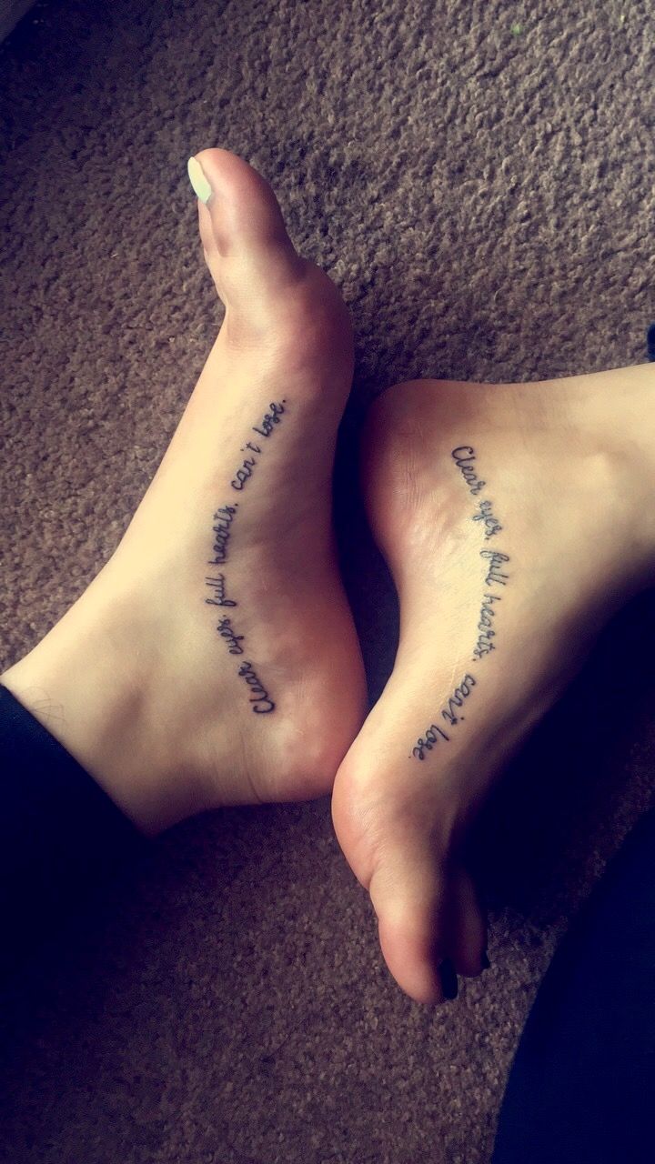 two people with tattoos on their feet that say, i love you to the moon and back