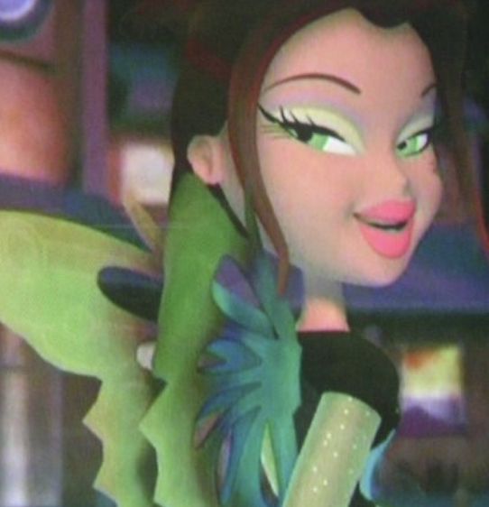 the animated tinkerbell fairy has green eyes and is holding a flower in her hand