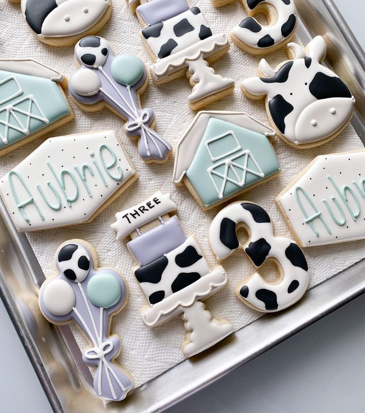 decorated cookies in the shape of farm animals