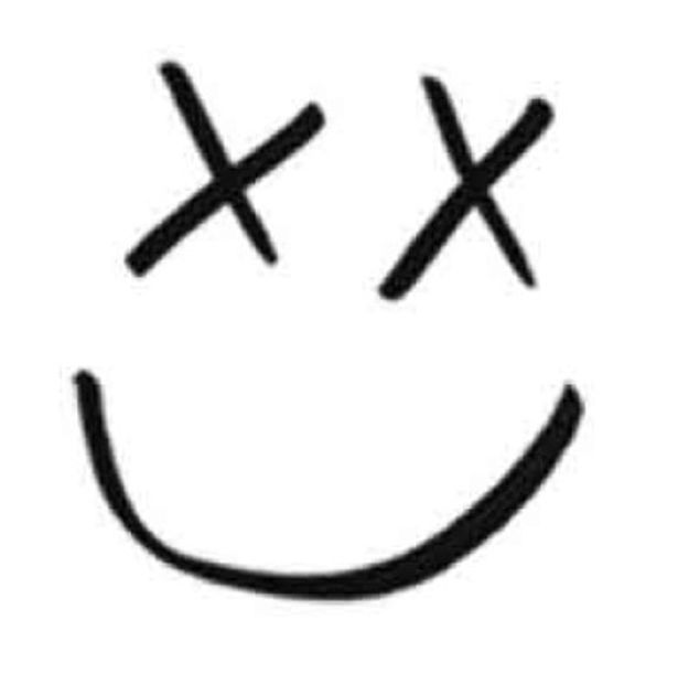 a smiley face with two crosses drawn on it