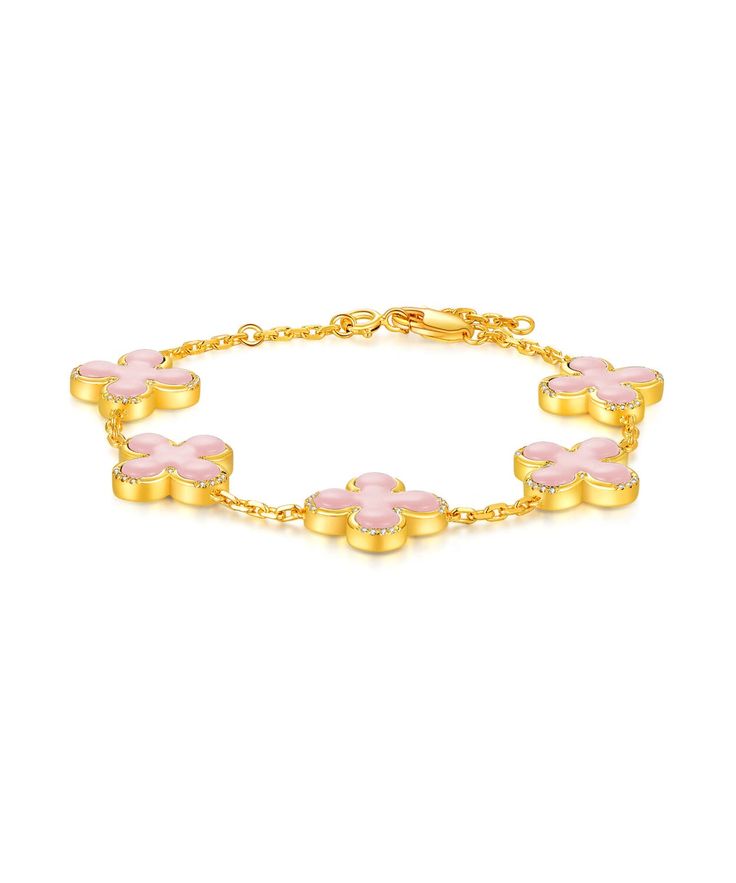 ✧ Material: 24K Yellow Gold Filled | 925 Sterling Silver ✧ Stone: Pink Shell + Diamond Simulant Adorn yourself with the delicate beauty of our 24K Gold Pink Shell Clover Bracelet, where elegance meets natural allure in a stunning piece of jewelry. Meticulously handcrafted, this bracelet is a true symbol of refined craftsmanship and timeless charm. Craftsmanship and Materials: Each bracelet is meticulously crafted with a solid layer of 24K gold over a 925 sterling silver base, ensuring durability Elegant Pink Gold-plated Bracelets, Pink Clover, Popular Bracelets, Clover Bracelet, Diamond Simulant, Delicate Beauty, Cross Bracelet, Gold Cross, Chain Ring