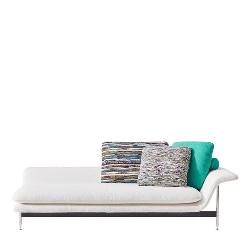 a white couch with colorful pillows on it's back and side cushions in different colors