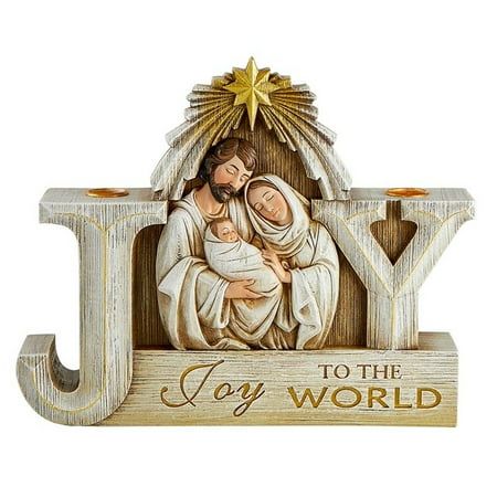 a wooden nativity sign with the words joy to the world