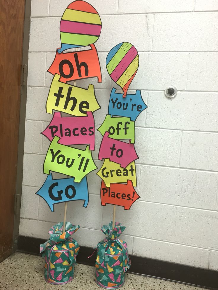 two candy bags are sitting next to each other on top of sticks that say oh the places off you'll go