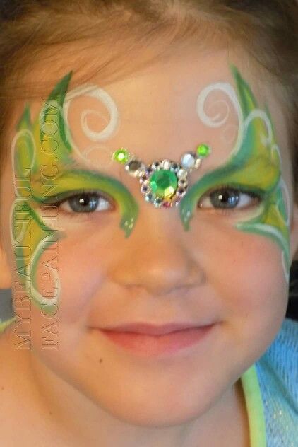 Tinkerbell style green face paint with bling by www.facebook.com/mybeautifulbling. Tinker Bell Face Paint, Green Face Paint Ideas, Tinkerbell Face Paint, Frog Face Paint, School Spirit Face Paint, Tinkerbell Makeup, Face Painting Unicorn, Green Face Paint, Fairy Face Paint