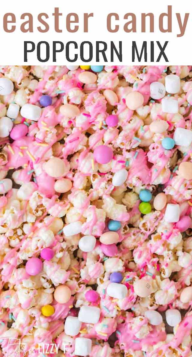 a pile of popcorn with marshmallows and candy on top that says easter candy popcorn mix