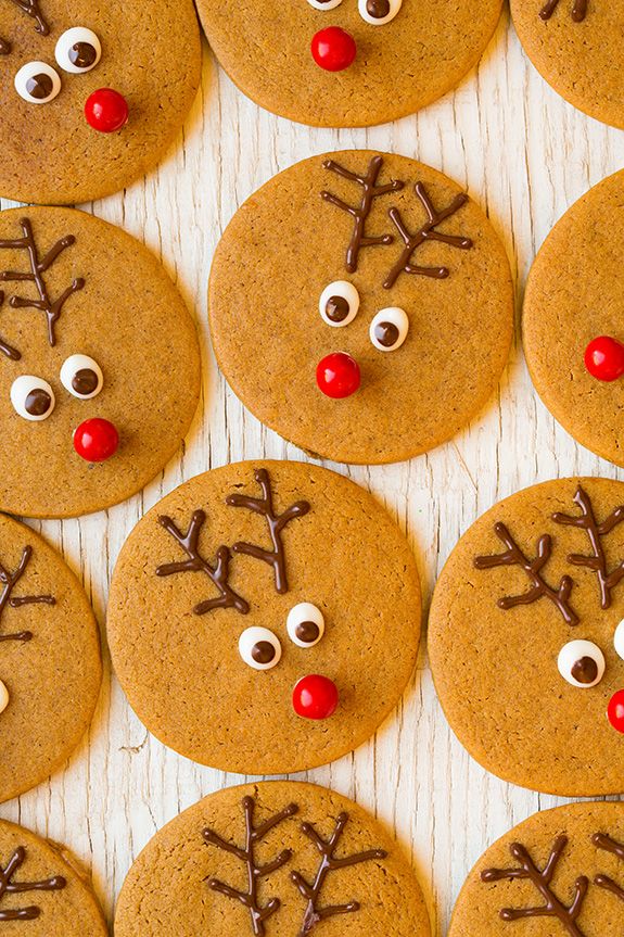 several cookies decorated like reindeer faces with red noses