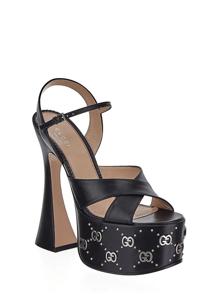 100% calf leather - Inner: Leather - Insole: Leather - Sole: Leather - Round toe - Adjustable buckle strap - Silver-tone studs on the platform - Heel 17 cm - Sole height 6cm Designer High Heel Platform Sandals, Evening Platform Heels In Calf Leather, Gucci Open Toe Sandals With Buckle Closure, Gucci Sandals With Buckle Closure And Open Toe, Luxury High Heel Sandals With Studded Outsoles, Calf Leather Platform Heels With Ankle Strap, Gucci Ankle Strap Leather Sandals, Gucci Luxury Sandals With Buckle Closure, Luxury Gucci Sandals With Buckle Closure