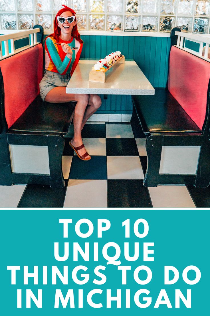 a woman sitting at a table with a piece of cake in her hand and the words top 10 unique things to do in michigan