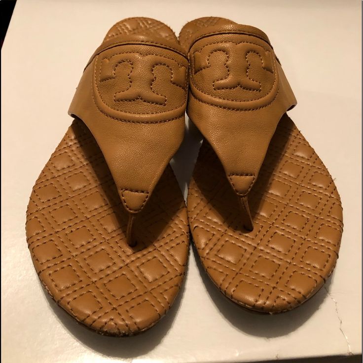 Tory Burch Quilted Sandals Excellent Condition Tan Leather Footbed Slip-on Sandals, Classic Tan Sandals For Spring, Designer Cushioned Beach Sandals, Casual Tan Synthetic Sandals, Tan Slip-on Sandals With Branded Insole, Tan Flat Sandals With Leather Footbed, Tan Sandals With Leather Footbed And Flat Heel, Tan Flat Heel Sandals With Leather Footbed, Tan Sandals With Cushioned Footbed And Flat Heel