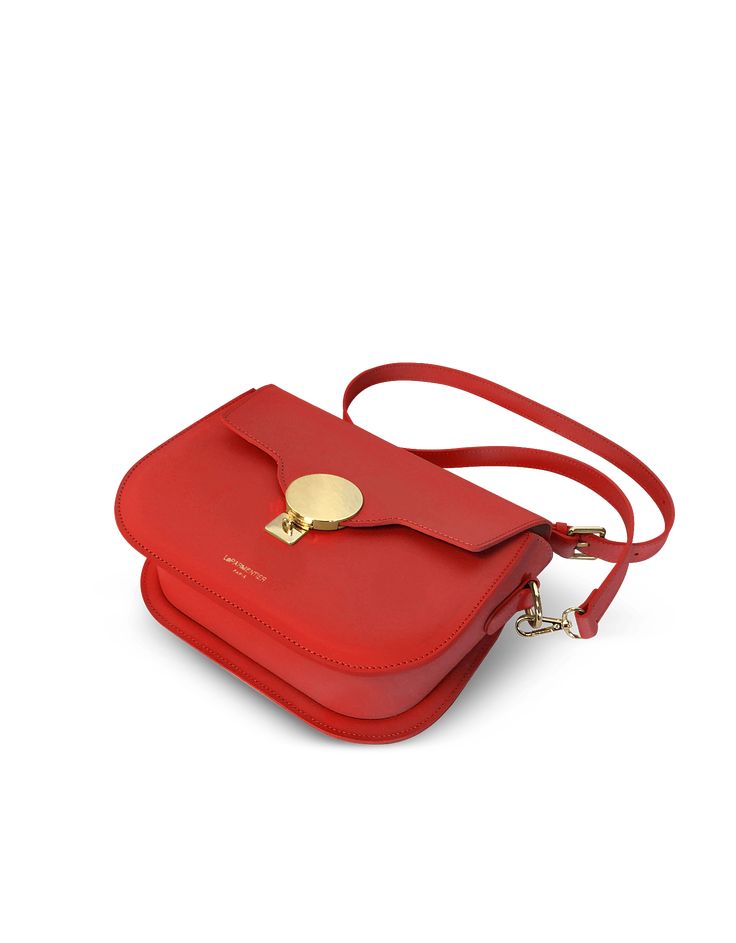 San Pedro bag is the perfect combination of practicality and elegance both in order to enjoy its design in every situation. Crafted in genuine leathers it guarantees quality and confort also with its comfortable and adjustable shoulder strap. The squared flap ends in a rounded shape to envelope the top magnetic snap closure, more specifically the bold hardware detail on it. Red color. Proudly made in Italy. 100% Calf Leather  When not being used,  we suggest to avoid storing the bag in humid pla Luxury Square Bag With Detachable Strap, Luxury Everyday Square Bag With Detachable Strap, Everyday Luxury Square Bag With Detachable Strap, Modern Flap Bag With Magnetic Closure For Everyday Luxury, Timeless Luxury Shoulder Bag With Adjustable Strap, Everyday Luxury Square Shoulder Bag With Detachable Handle, Timeless Everyday Luxury Shoulder Bag With Adjustable Strap, Timeless Red Shoulder Bag For Daily Use, Timeless Red Shoulder Bag For Everyday