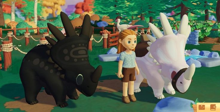 a girl standing next to a black and white animal in a park with other animals