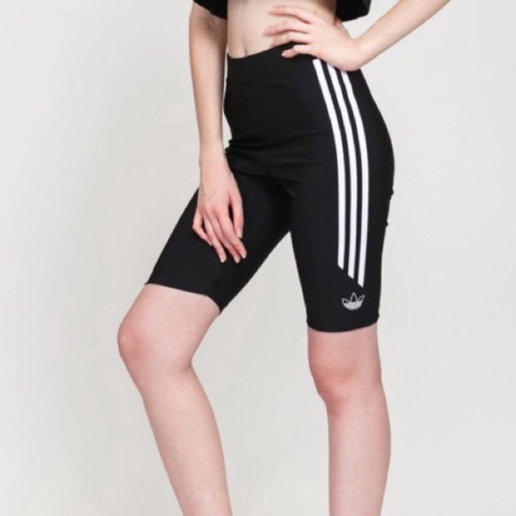 Adidas Originals Short Tights New With Tags Size Xs Biker Shorts Black With White Stripes And Stitching Biker Shorts Bike Shorts Trendy Black Knee-length Shorts, Black Knee-length Athleisure Activewear, Black Sportswear Biker Shorts For Cycling, Stretch Workout Shorts With Three Stripes, Stretch Three Stripes Short Bottoms, Stretch Adidas Shorts With Three Stripes, Stretch Gym Shorts With Three Stripes, Black Sporty Leggings For Summer, White Short Length Biker Shorts Sportswear