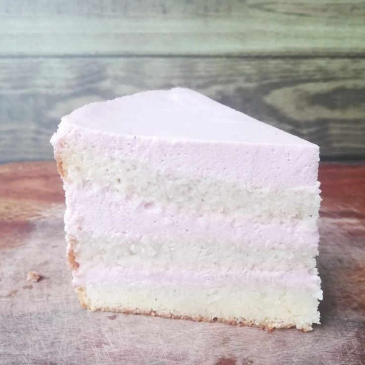 a piece of cake sitting on top of a wooden table