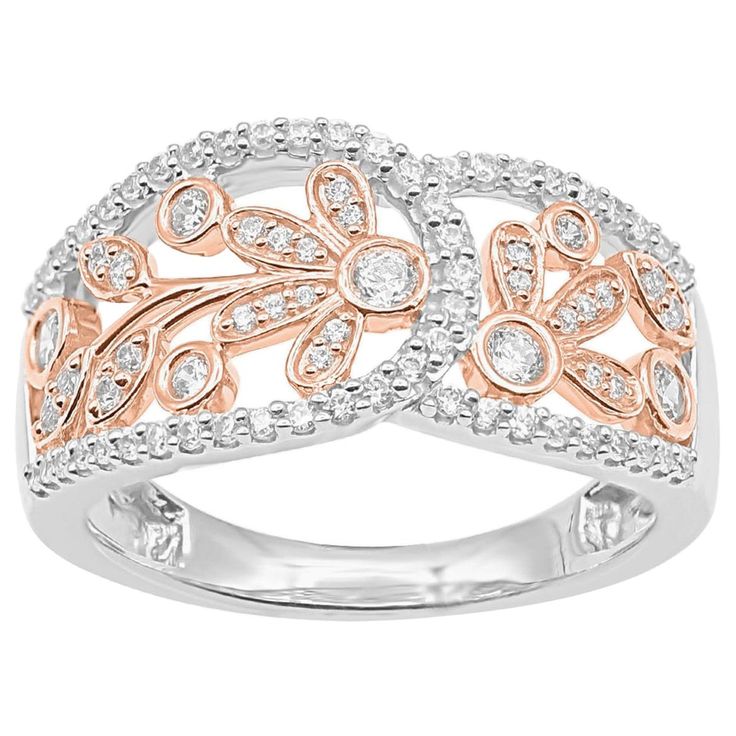 two tone gold and white diamond ring with floral design on the side, set in 18k