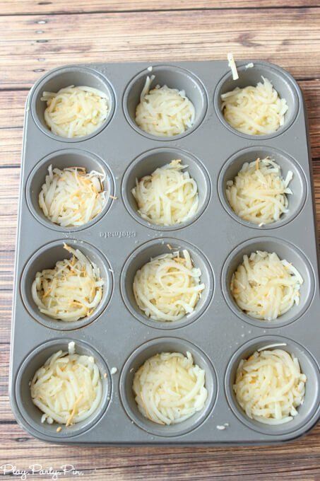 cupcakes with cheese in a muffin tin