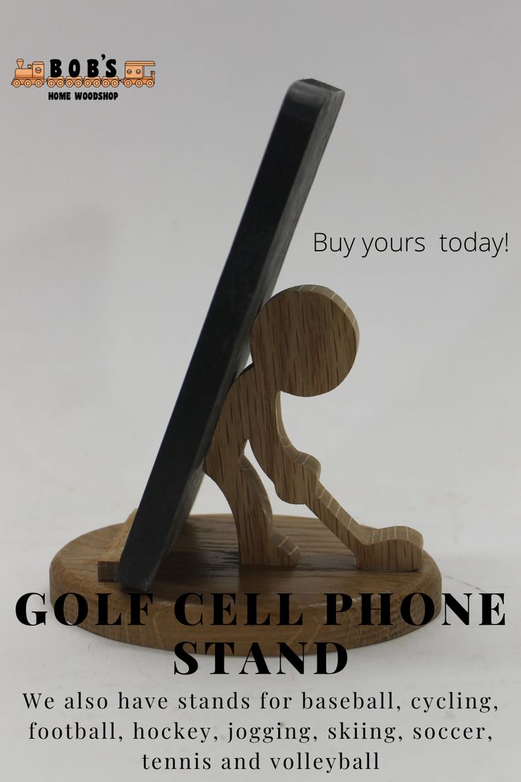 an advertisement for a cell phone stand with a wooden figure holding a baseball bat on it