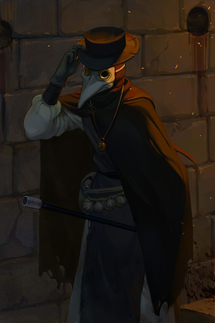 a man in a hat and cloak standing next to a brick wall with fire coming from it