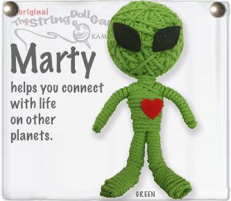 a crocheted green alien holding a red heart with the words mary helps you connect with life on other planets