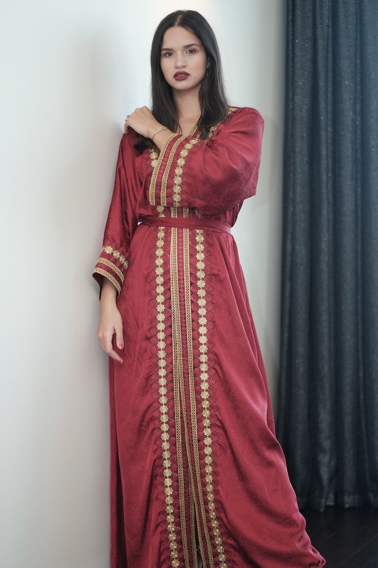 red plus size embroidered kimono Elegant Long Sleeve Red Abaya, Elegant Red Long Sleeve Abaya, Elegant Red Kaftan For Evening, Elegant Long Sleeve Abaya With Gold Embroidery, Elegant Embroidered Kaftan For Formal Occasions, Elegant Embroidered Kimono For Eid, Formal Embroidered Kaftan With Traditional Drape, Fitted Red Long Sleeve Kaftan, Formal Festive Long Sleeve Kaftan