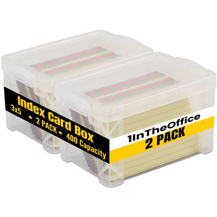 two clear storage boxes filled with index cards