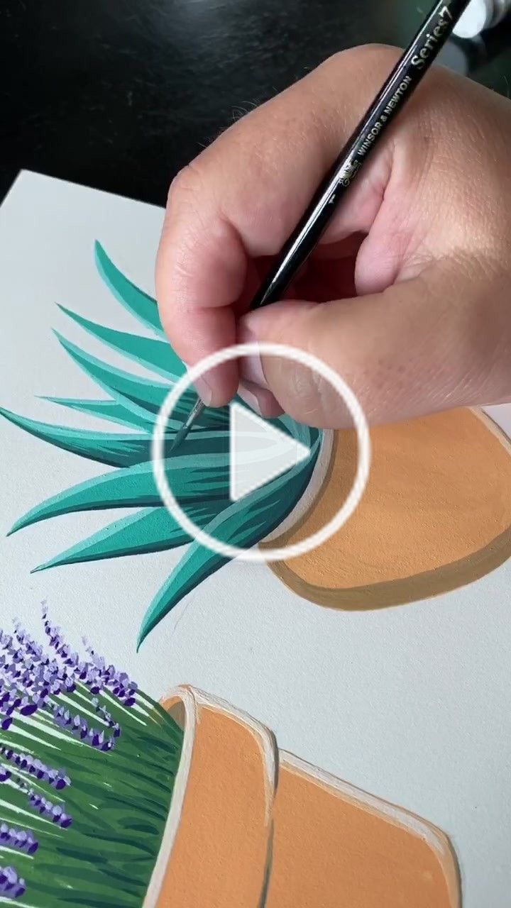 a person is drawing with colored pencils on a piece of paper that has purple flowers in it