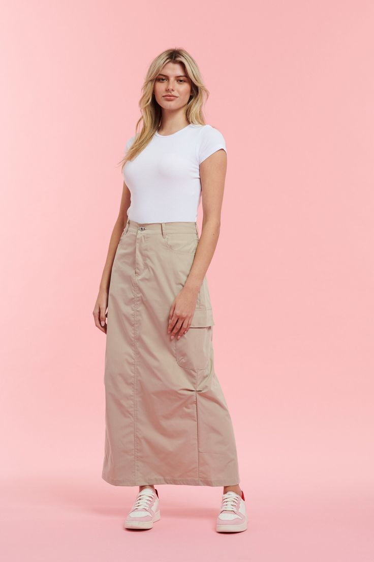 Beige maxi skirt with pockets Oversized fit Light beige colour Raw edge on the back Fabric: 100% Polyester Full Length Relaxed Fit Maxi Skirt With Side Pockets, Casual Beige Maxi Bottoms, Khaki Wide Leg Skirt With Pockets, Long Khaki Skirt Outfit, Long Cargo Skirt With Pockets, Beige Maxi Skirt Outfit, Beige Maxi Skirt, Beige Cargo Skirt Outfit, Beige Maxi Length Lined Skirt Bottoms