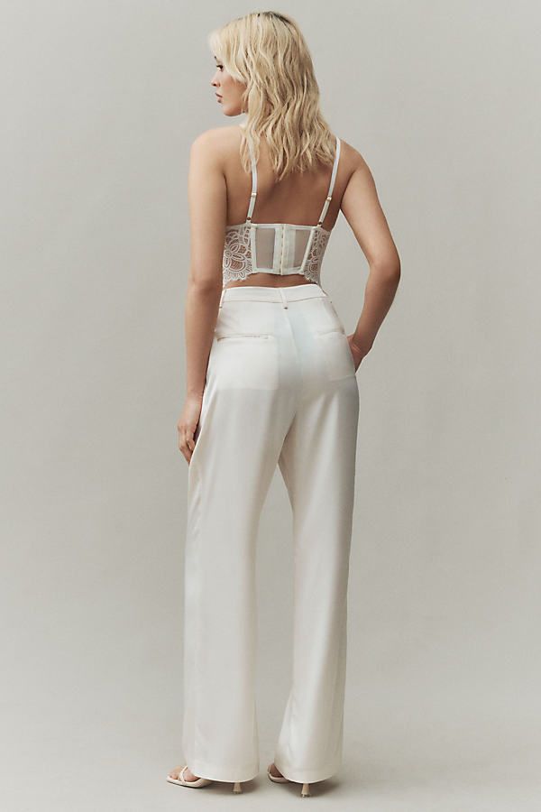 Naia™ Renew acetate, polyester Button front Machine wash Imported | Mason Satin Pants by Reformation in White, Women's, Size: 8, Polyester/Acetate at Anthropologie Elegant Tapered Leg Dress Pants With Button Closure, Elegant Bottoms With Button Closure, Elegant Wide Leg Trousers With Button Closure, Elegant High Waist Dress Pants With Button Closure, Elegant Straight Dress Pants With Button Closure, Elegant Trousers With Button Closure, Elegant High-waisted Wide Leg Pants With Button Closure, Elegant Tailored Wide Leg Pants With Button Closure, Fitted Wide Leg Trousers With Button Closure