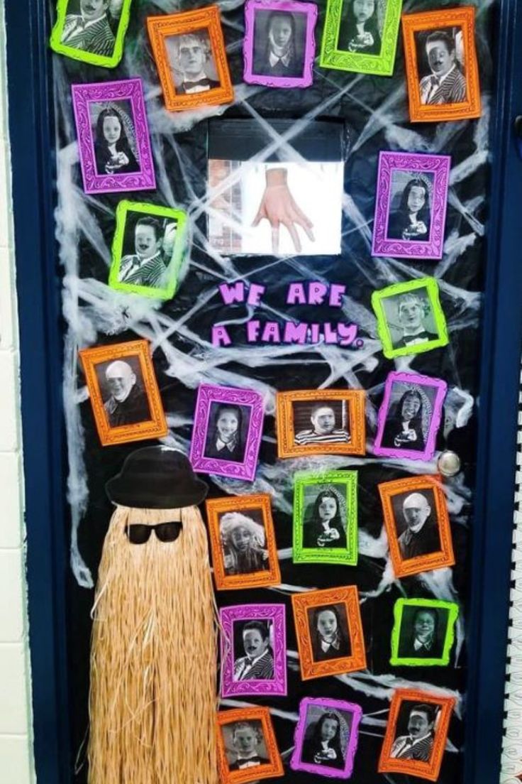 a door decorated with halloween decorations and pictures