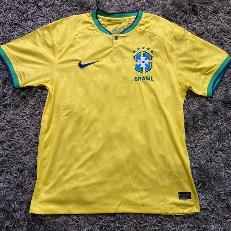 Brazil Football Jersey, Brazil Shirt Outfit Men, Vintage Brazil Jersey, Yellow Sports Shirt For Summer, Yellow Summer Sports Shirt, Brazil Jersey Outfit Men, Nike Yellow Short Sleeve T-shirt, Yellow Nike T-shirt With Short Sleeves, Nike Yellow Summer Tops