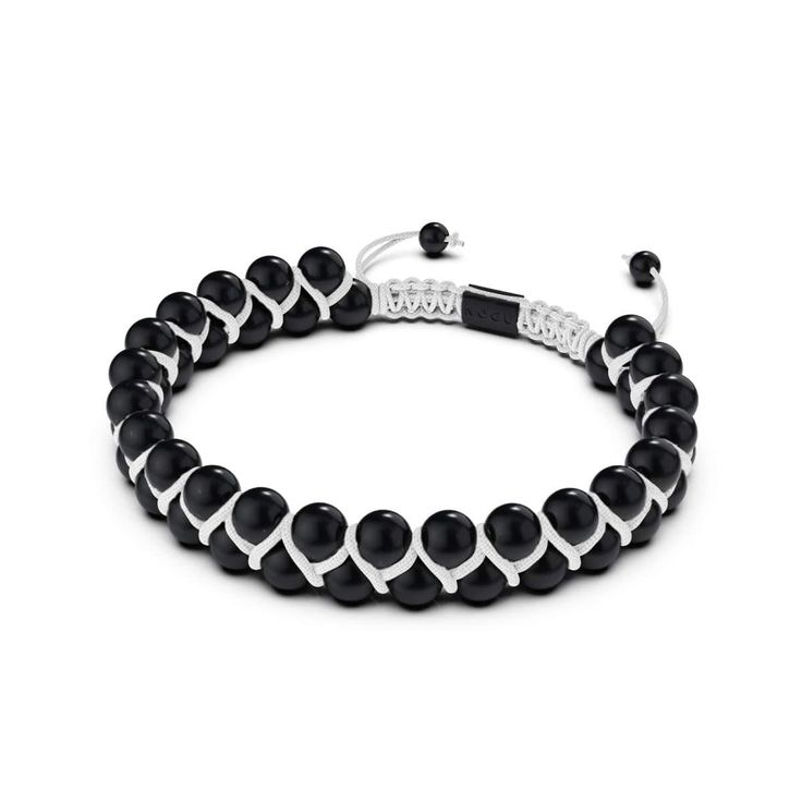 The Vitality bracelet from NOGU features a gunmetal metal finish and a stainless steel base. The adjustable nylon cord, one-size-fits-all design, and smooth beaded pull-cord drawstrings make this bracelet a versatile accessory. Available in gunmetal, silver, 18k gold, 18k rose gold, two tone gold, and black gunmetal plated stainless steel options, the Vitality bracelet is a unisex piece that adds a touch of sophistication to any outfit. Adjustable Modern Braided Bracelets, Trendy Adjustable Braided Jewelry, Black Nylon Cord Casual Jewelry, Adjustable Black Braided Beaded Bracelets, Casual Black Hand Wrapped Braided Bracelets, Casual Black Hand Wrapped Braided Bracelet, Casual Black Nylon Cord Jewelry, Elegant Black Bracelet With Adjustable Cord, Adjustable Flexible Black Bracelets