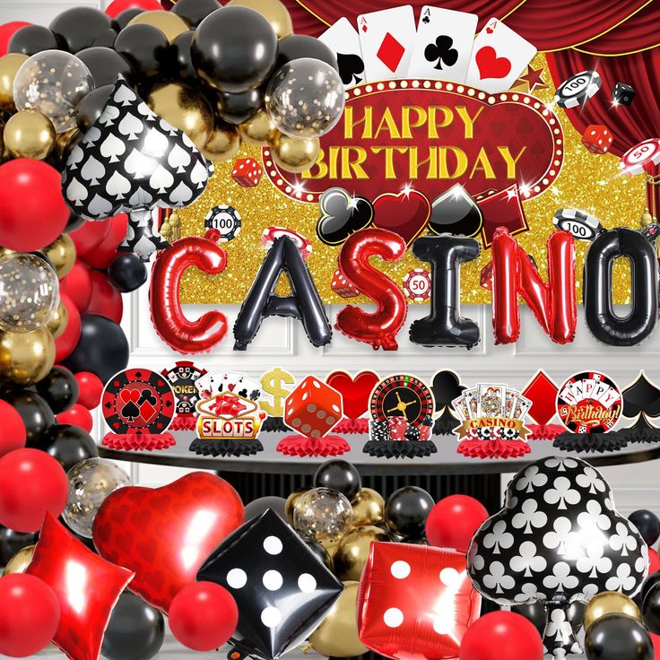 a casino themed birthday party with balloons and streamers